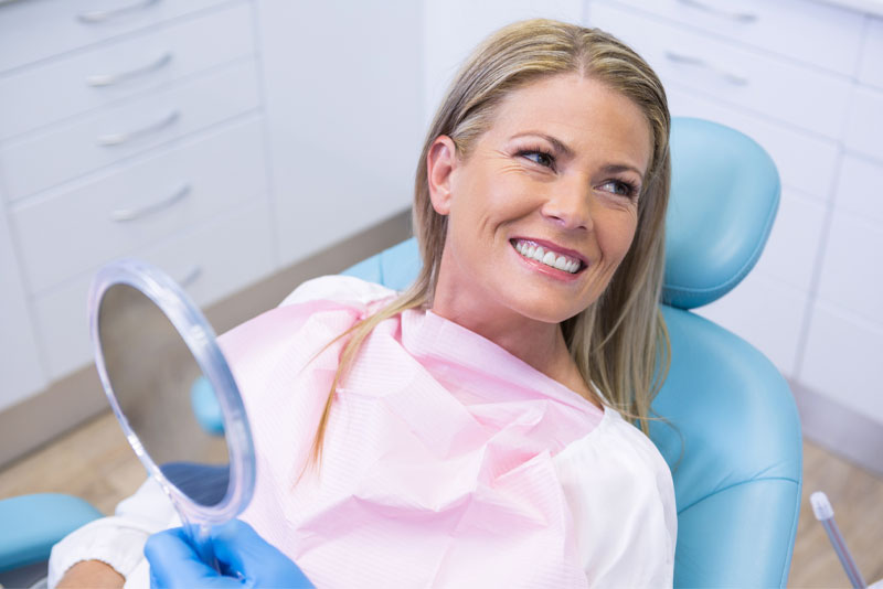 Dental Patient Smiling After Her LANAP Gum Disease Treatment