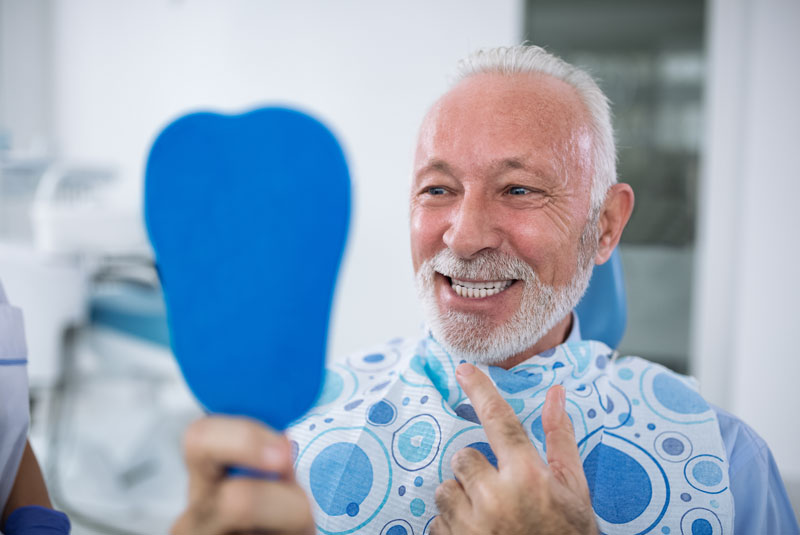 Dental Implant Patient Smiling After A Procedure