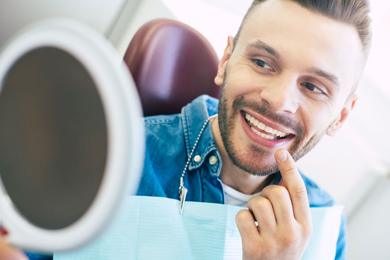 Dental Patient Smiling After His Dental Implant Procedure